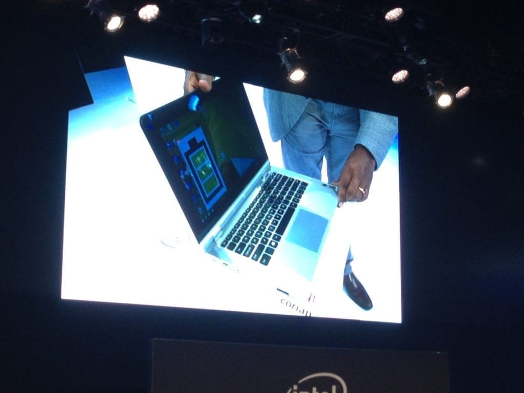 An Intel Presenter Demoing a Wireless Charging Laptop