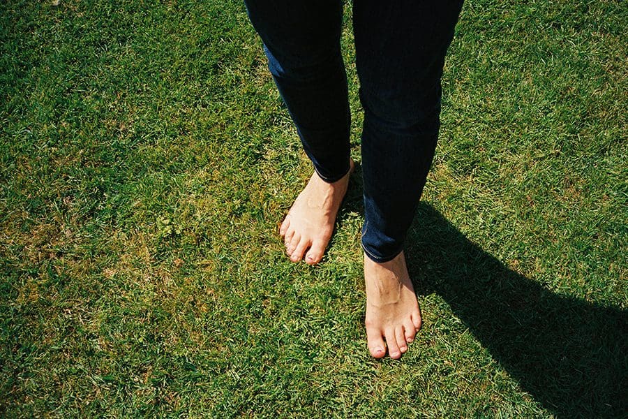 Grounding with bare feet on grass