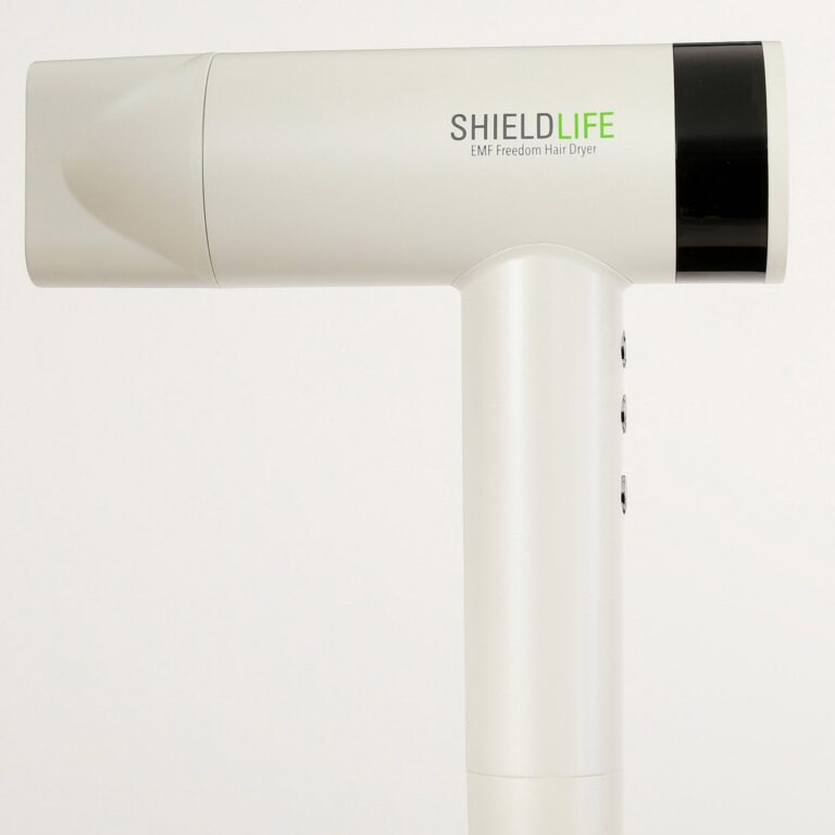 White ShieldLife handheld device with green logo, sleek minimalist design, appears to be an electronic product with a curved white body and black end cap