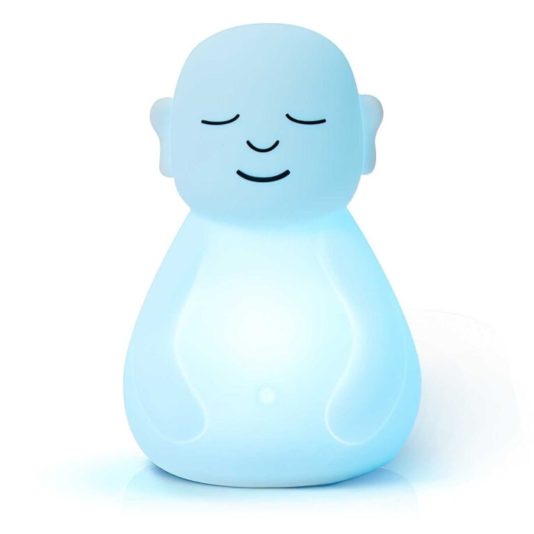 Soft blue glowing meditation figure nightlight with closed eyes and rounded body, minimalist design on white background