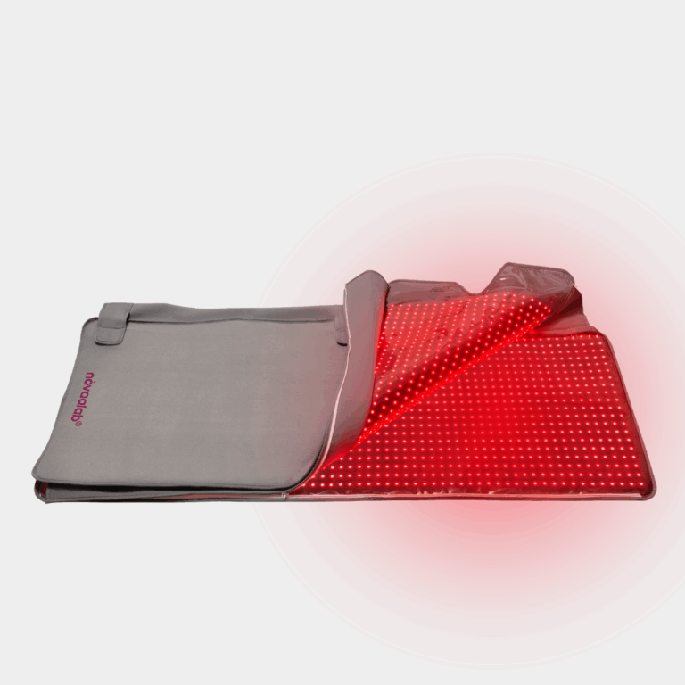 Gray laptop sleeve with red protective interior featuring dotted texture, partially unfolded to reveal radiation-blocking design