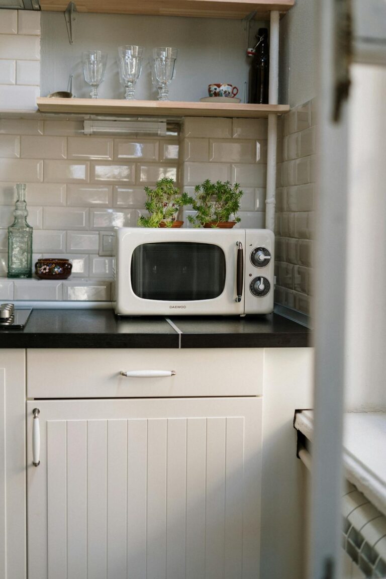 Silver microwave oven on kitchen counter